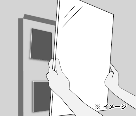 ① 壁に貼り付ける鏡